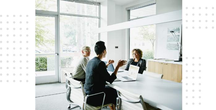 Business people sitting at a table during a meeting.